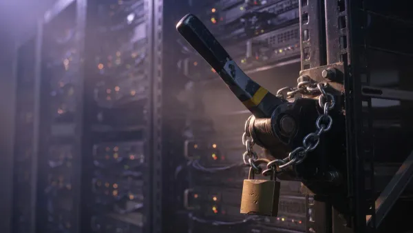 Server room lever chained in place with a brass padlock under violet and copper light, for Entra November 2026 changes